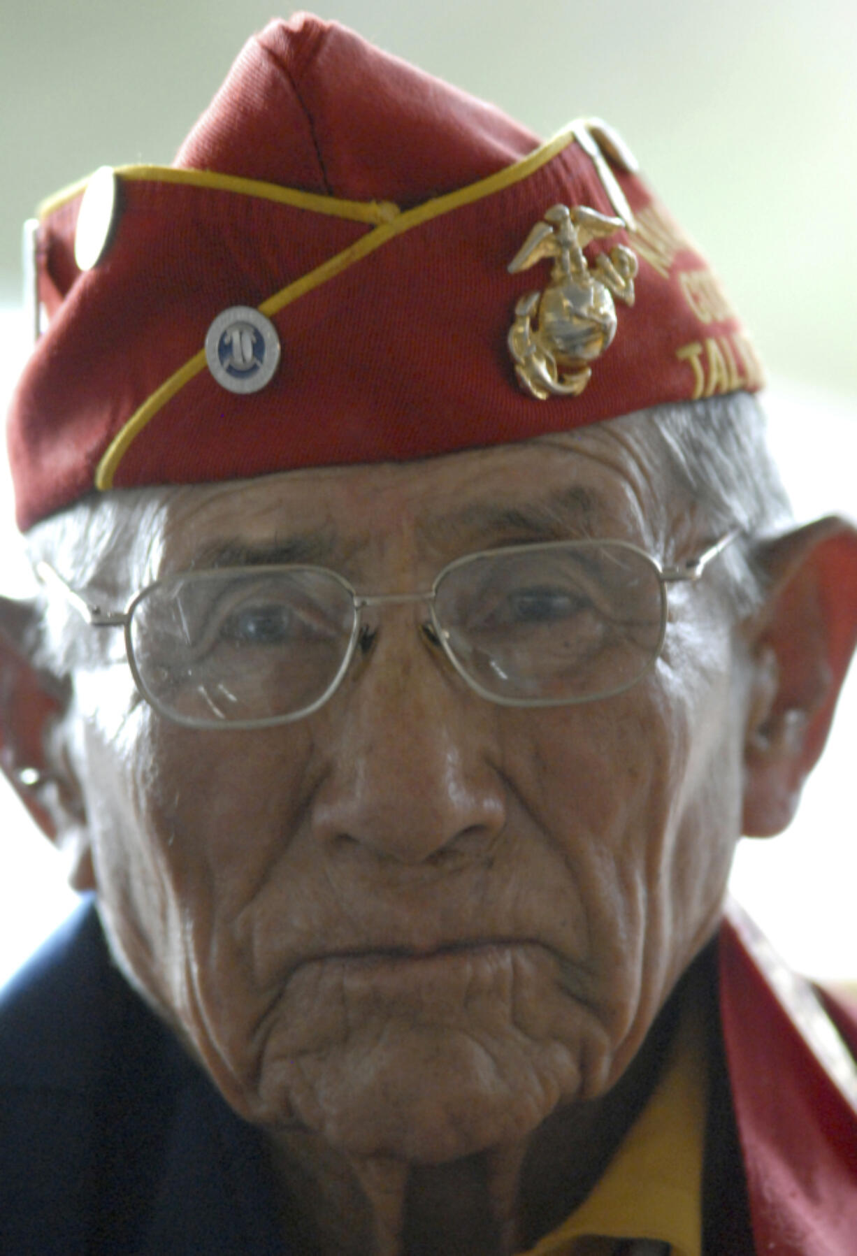 FILE - Navajo Code Talker John Kinsel Sr., of Lukachukai, Ariz., listens as his comrades speak of their WWII experiences Tuesday Aug. 14, 2007, in Window Rock, Ariz.