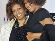 FILE - Singers Cissy Houston, left, and her daughter Whitney Houston appear at the &quot;Keep A Child Alive Black Ball&quot; in New York on Sept. 30, 2010. Cissy Houston, a two-time Grammy winner who performed alongside superstar musicians like Elvis Presley and Aretha Franklin, died Monday, Oct. 7, 2024, in her New Jersey home She was 91.