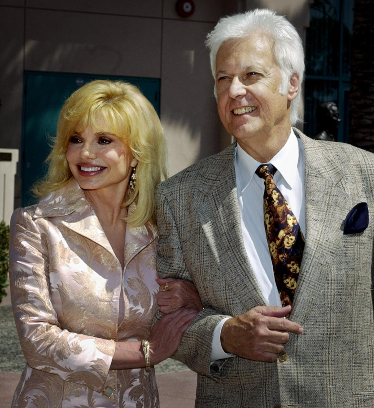 FILE - Loni Anderson and Jack Jones arrive for &ldquo;The Bob Hope Memorial Tribute&rdquo; show at the Academy of Television Arts and Sciences headquarters in Los Angeles&rsquo; North Hollywood area Wednesday, Aug. 27, 2003. Jack Jones, a Grammy-winning crooner known for &ldquo;The Love Boat&rdquo; television show theme song, has died, Wednesday, Oct. 23, 2024.