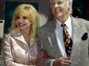 FILE - Loni Anderson and Jack Jones arrive for &ldquo;The Bob Hope Memorial Tribute&rdquo; show at the Academy of Television Arts and Sciences headquarters in Los Angeles&rsquo; North Hollywood area Wednesday, Aug. 27, 2003. Jack Jones, a Grammy-winning crooner known for &ldquo;The Love Boat&rdquo; television show theme song, has died, Wednesday, Oct. 23, 2024.