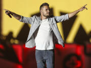 FILE - Liam Payne of One Direction performs during the Honda Civic Tour at Qualcomm Stadium on Thursday, July 9, 2015, in San Diego, Calif.