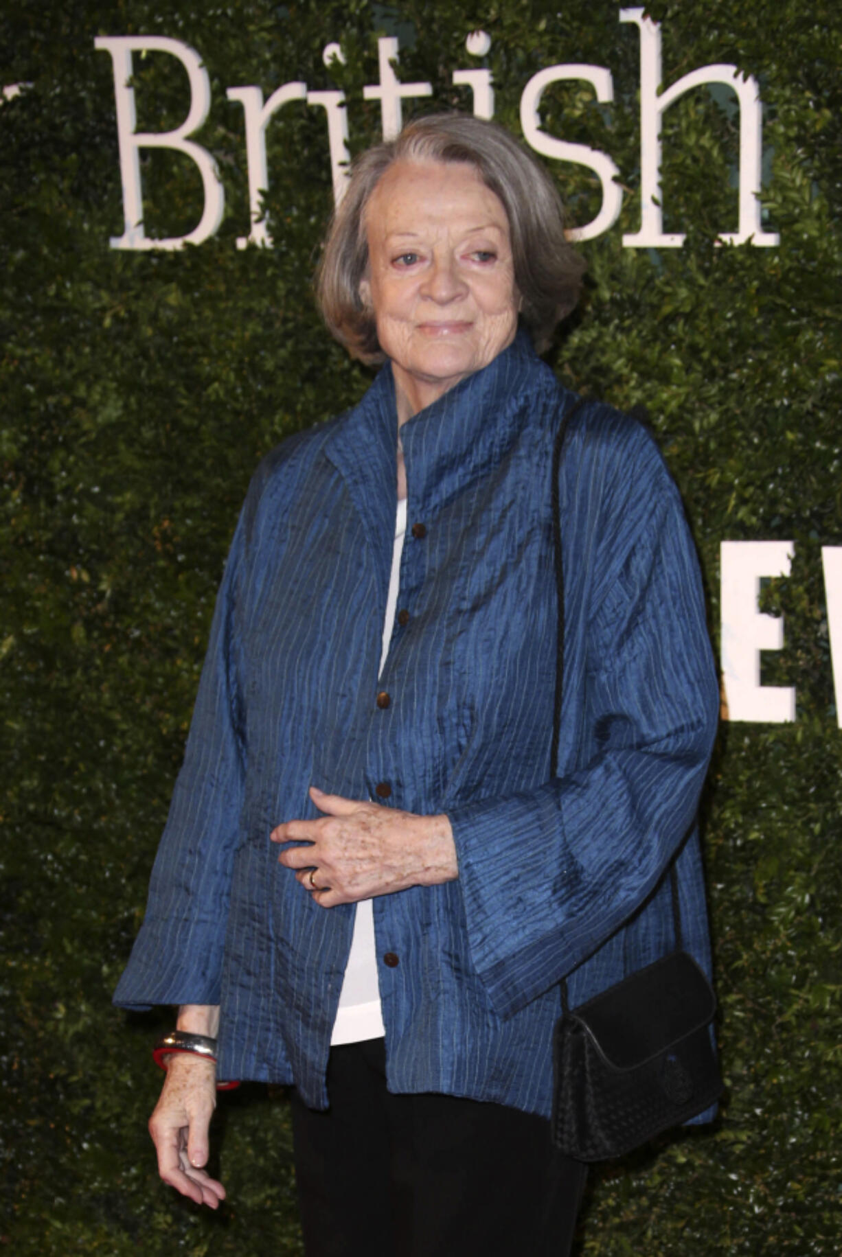 FILE - Actress Maggie Smith appears at the Evening Standard British Film Awards in London on Feb. 7, 2016. Smith, who won an Oscar for &ldquo;The Prime of Miss Jean Brodie&rdquo; in 1969 and won new fans in the 21st century as the dowager Countess of Grantham in &ldquo;Downton Abbey,&rdquo; has died at 89.