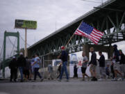 Striking longshoreman picket outside the Packer Avenue Marine Terminal Port, Tuesday, Oct. 1, 2024, in Philadelphia.