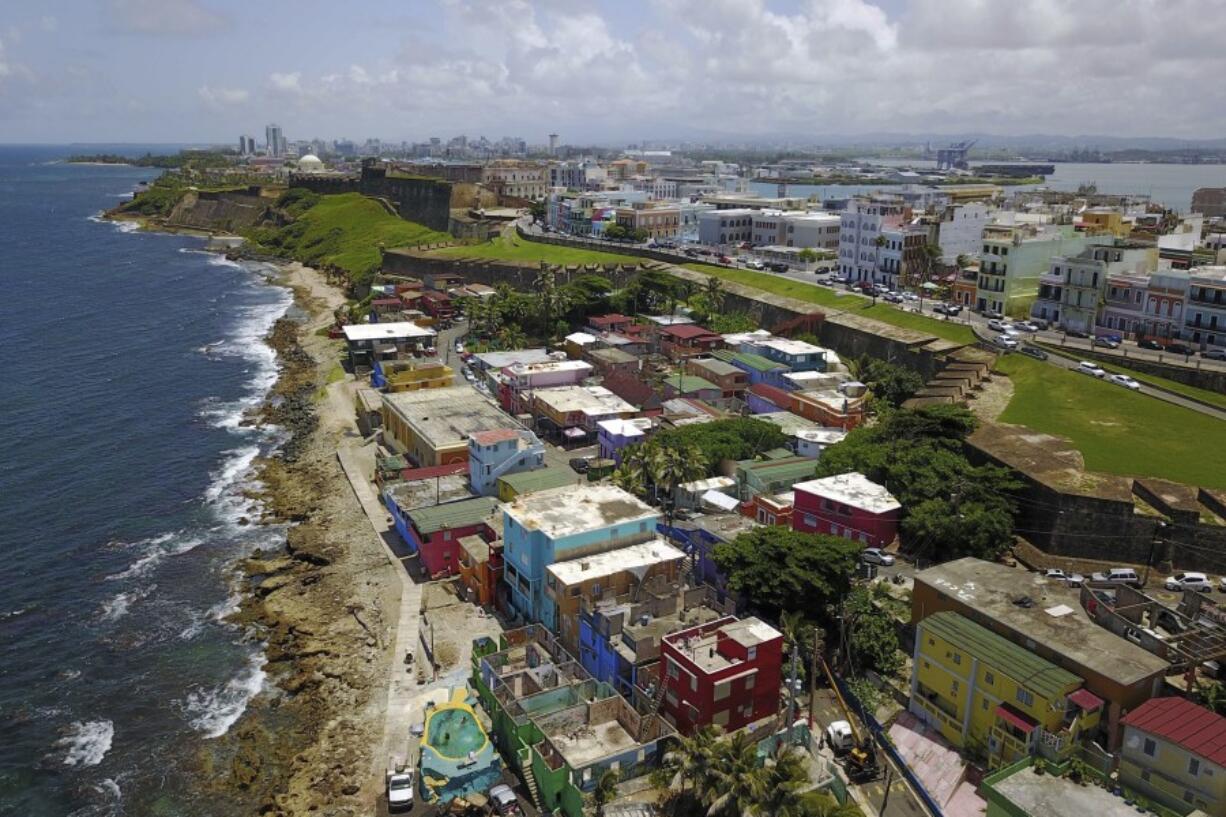 FILE - An aerial view of the seaside neighborhood of La Perla, in San Juan, Puerto Rico, is seen on Aug. 25, 2017.