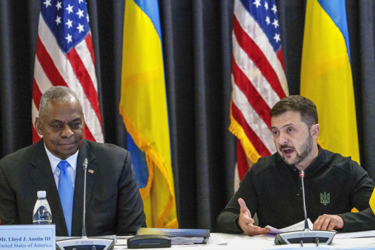 FILE - U.S. Defense Secretary Lloyd Austin, left, listens to Ukraine&#039;s President Volodymyr Zelenskyy during a meeting at Ramstein Air Base in Ramstein-Miesenbach, Germany, Friday, Sept. 6, 2024.