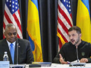 FILE - U.S. Defense Secretary Lloyd Austin, left, listens to Ukraine&#039;s President Volodymyr Zelenskyy during a meeting at Ramstein Air Base in Ramstein-Miesenbach, Germany, Friday, Sept. 6, 2024.