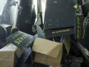 Parts of downed Shahed drones launched by Russia are piled in a storage room of a research laboratory in Kyiv, Ukraine, on Aug. 28, 2024.