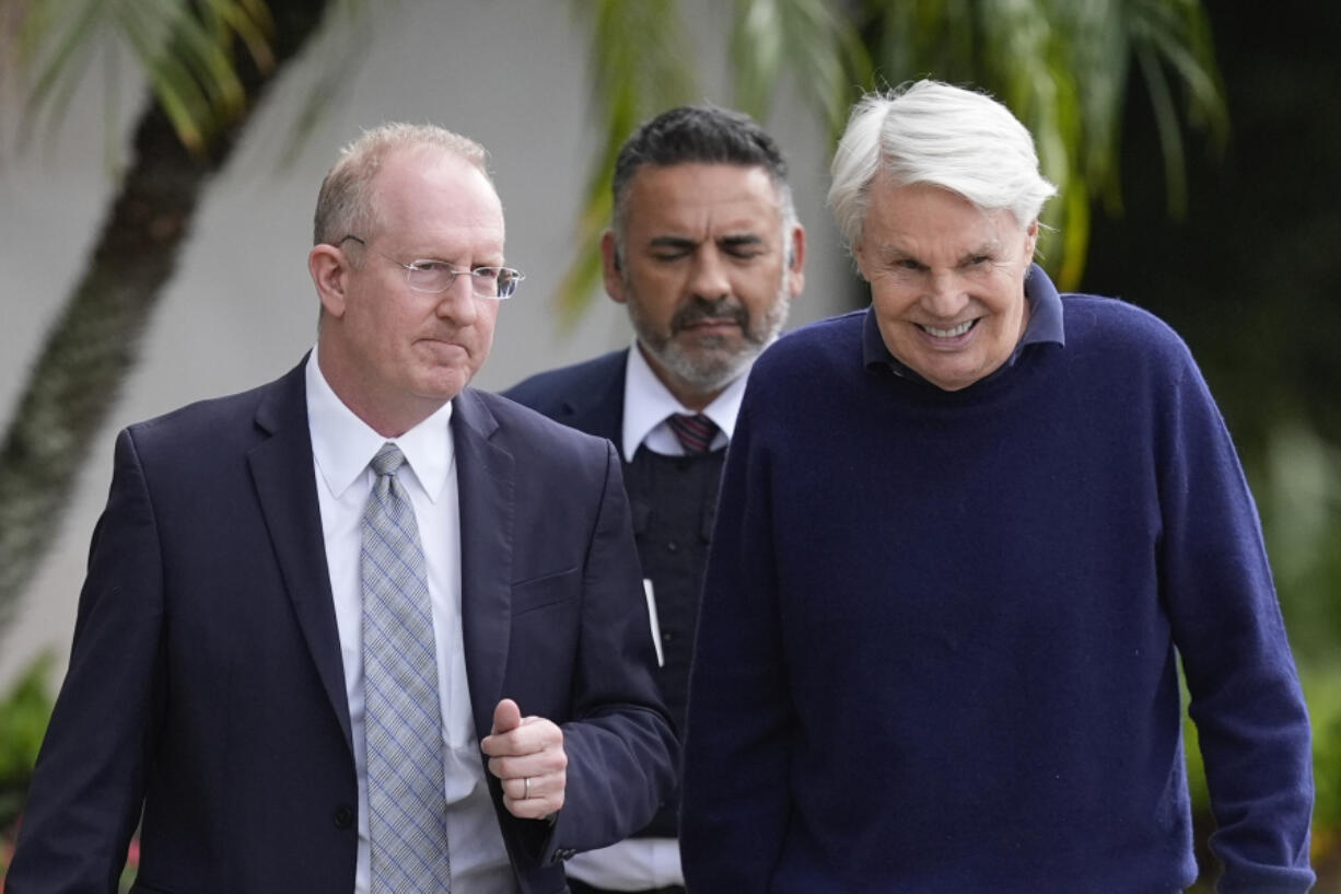 Michael Jeffries, right, former CEO of Abercrombie &amp; Fitch, leaves with his attorney Brian Bieber, left, following a hearing at the Paul G. Rogers Federal Building and U.S. Courthouse, in West Palm Beach, Fla., Tuesday, Oct. 22, 2024.