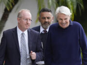 Michael Jeffries, right, former CEO of Abercrombie &amp; Fitch, leaves with his attorney Brian Bieber, left, following a hearing at the Paul G. Rogers Federal Building and U.S. Courthouse, in West Palm Beach, Fla., Tuesday, Oct. 22, 2024.