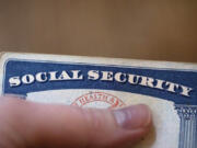 FILE - A Social Security card is displayed on Oct. 12, 2021, in Tigard, Ore.