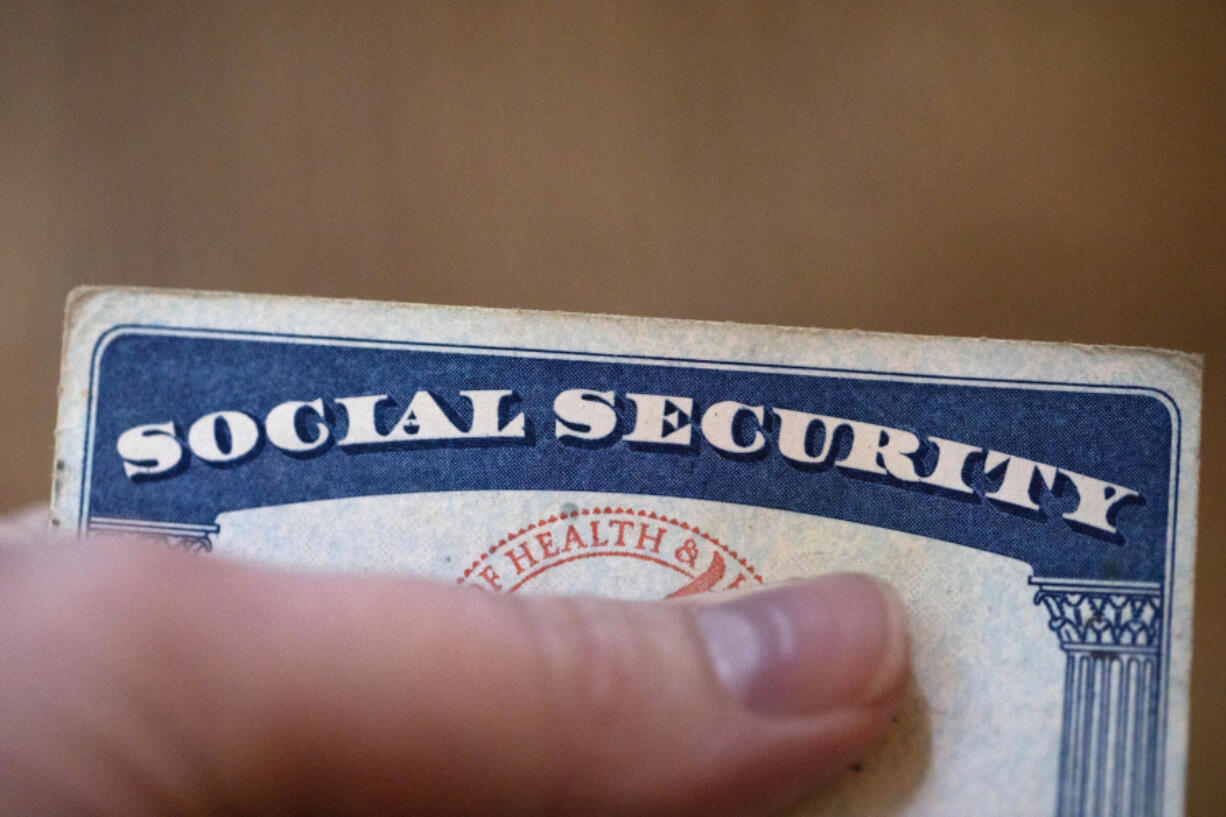 FILE - A Social Security card is displayed on Oct. 12, 2021, in Tigard, Ore.