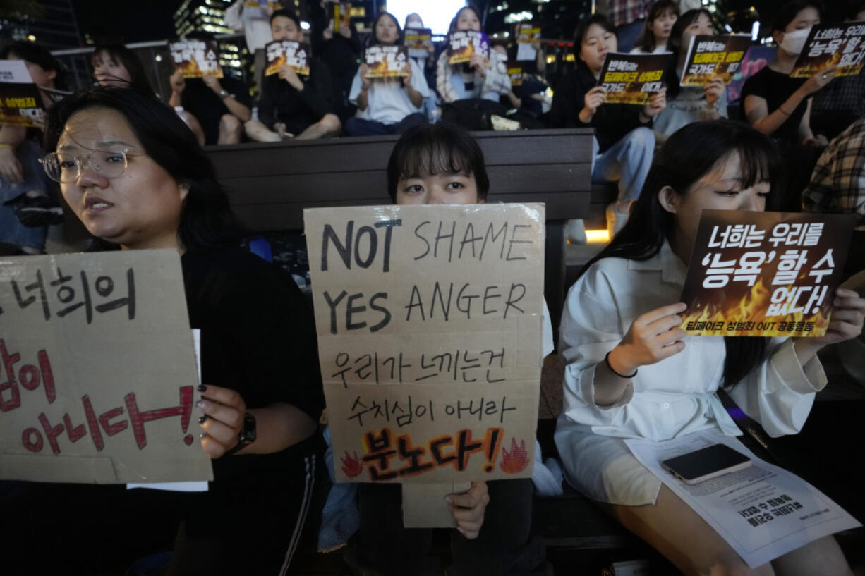 Citizens stage a rally against deepfake sex crime in Seoul, South Korea, Friday, Sept. 27, 2024.