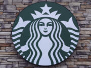 FILE - A Starbucks mermaid logo sign is displayed on a store, May 29, 2024, in Salem, N.H.