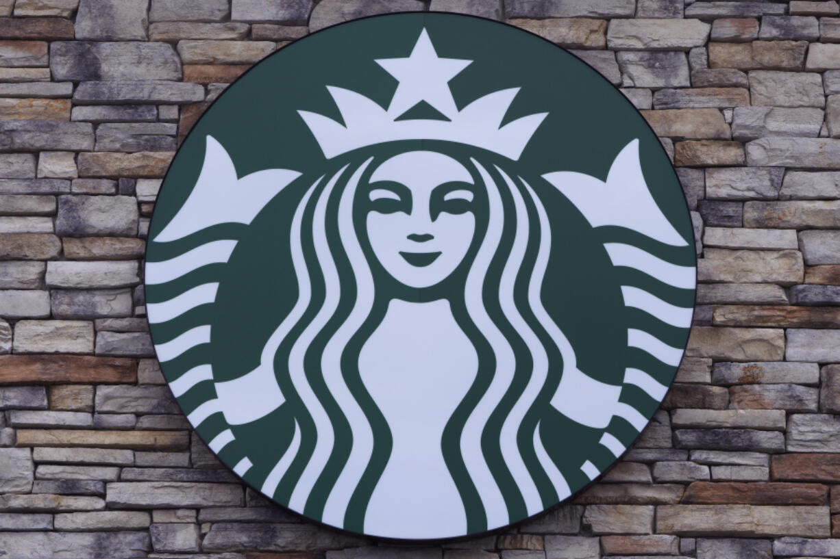 FILE - A Starbucks mermaid logo sign is displayed on a store, May 29, 2024, in Salem, N.H.