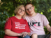 Denise Wieck and her son Guy Boyd, who was shot in the eye with a ghost gun, are seen Sept. 14 in Ypsilanti, Mich.