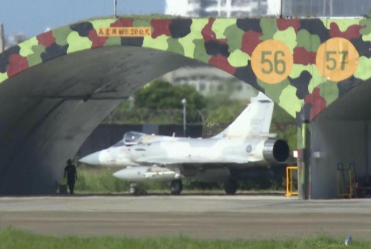 In this image taken from video, a Taiwanese air force French made Mirage-2000 fighter jet prepares for take off from the Hsinchu air base in Taiwan on Monday, Nov. 14, 2024.