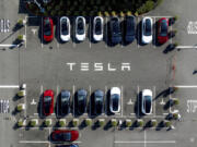 FILE - Tesla vehicles line a parking lot at the company&rsquo;s Fremont, Calif., factory, on Sept. 18, 2023.