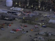 Emergency personnel arrive at oil refinery after hydrogen sulfide leaked Thursday, Oct. 10, 2024 in Houston.