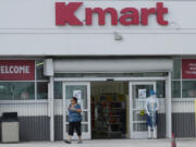 A customer exits the only Kmart store left in the continental United States, Tuesday, Oct. 22, 2024, in Miami.