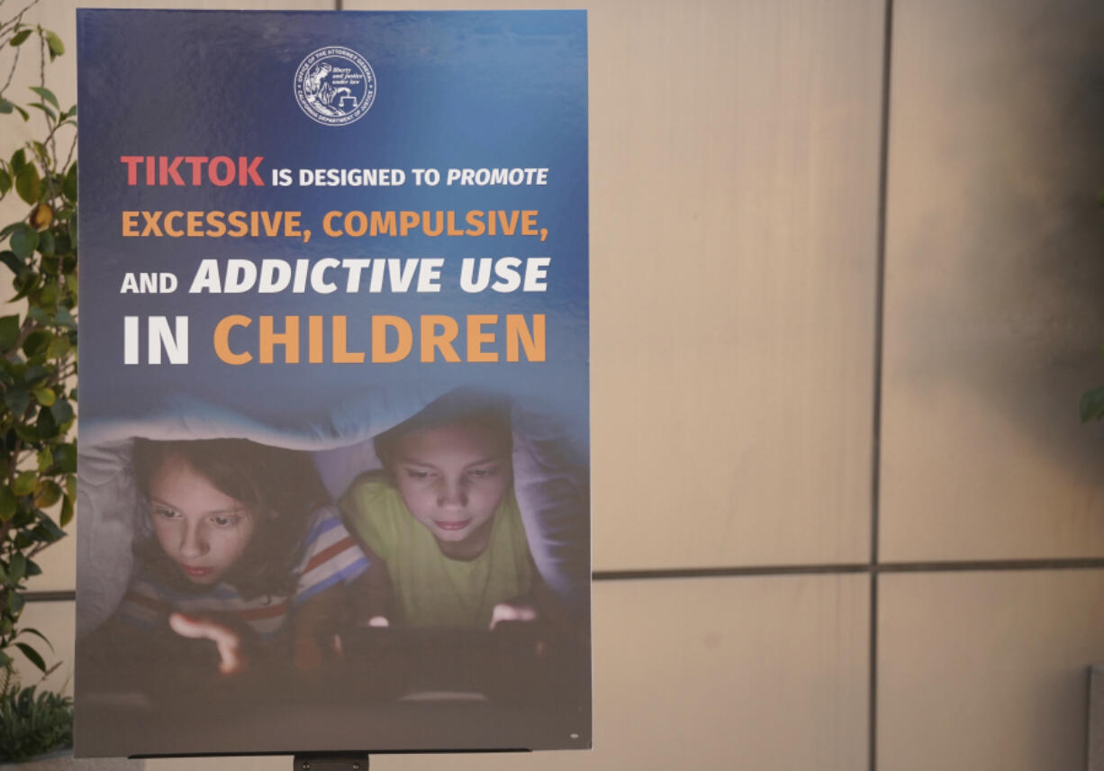 A poster board criticizing TikTok is displayed as California Attorney General Rob Bonta speaks during a press conference announcing a bipartisan coalition of attorney generals filing lawsuits against TikTok for violation of state consumer protection laws on Tuesday, Oct. 8, 2024, in San Francisco.