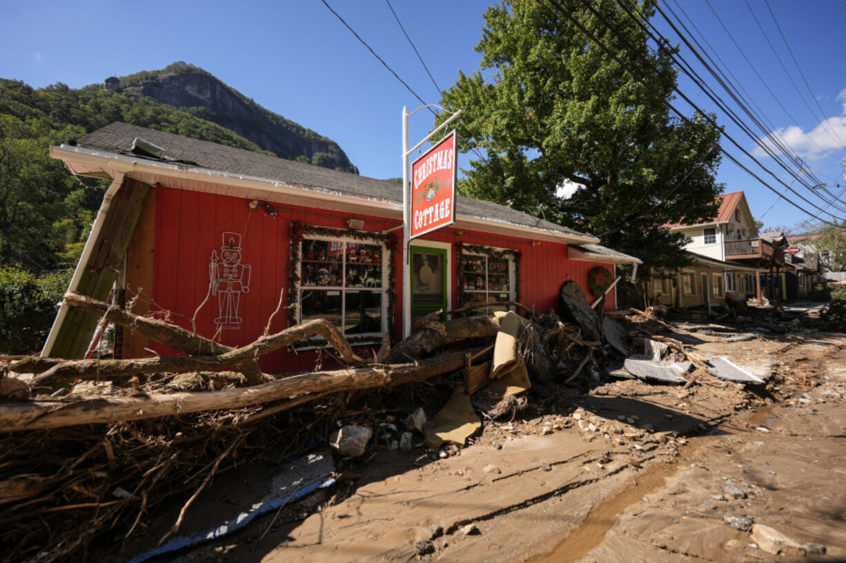 Businesses are seen in a debris field in the aftermath of Hurricane Helene, Wednesday, Oct. 2, 2024, in Chimney Rock Village, N.C.