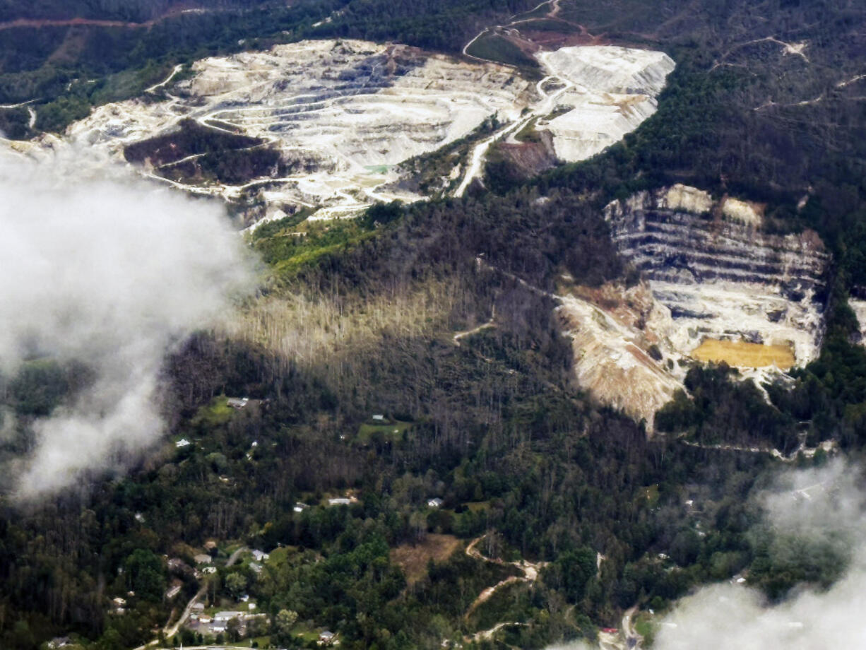 An aerial view of quartz mines in Spruce Pine, N.C., as taken from a plane on Monday, Sept. 30, 2024. (AP Photo/Gary D.