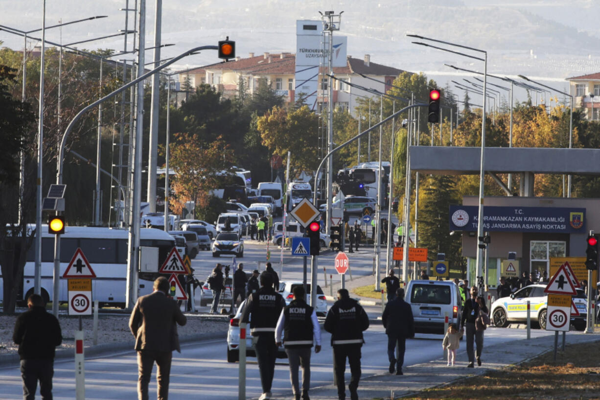 Emergency and security teams are deployed outside of Turkish Aerospace Industries Inc. at the outskirts of Ankara, Turkey, Wednesday, Oct. 23, 2024.