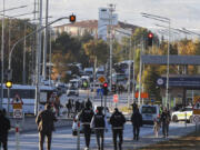 Emergency and security teams are deployed outside of Turkish Aerospace Industries Inc. at the outskirts of Ankara, Turkey, Wednesday, Oct. 23, 2024.