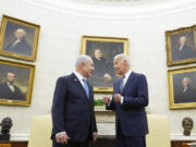 President Joe Biden, right, talks with Israeli Prime Minister Benjamin Netanyahu, left, in the Oval Office of the White House in Washington, July 25, 2024. U.S. officials say the Biden administration believes it has won assurances from Israel that it will not strike Iranian nuclear or oil sites as it looks to strike back following Iran&rsquo;s missile barrage earlier this month. The officials, who spoke on condition of anonymity to discuss private diplomatic discussions, cautioned that the pledge is not iron-clad and that circumstances could change.