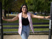 Julieth Luna Garcia, a transgender woman from El Salvador, poses for photos at Horner Park in Chicago, Monday, Sept. 30, 2024. (AP Photo/Nam Y.