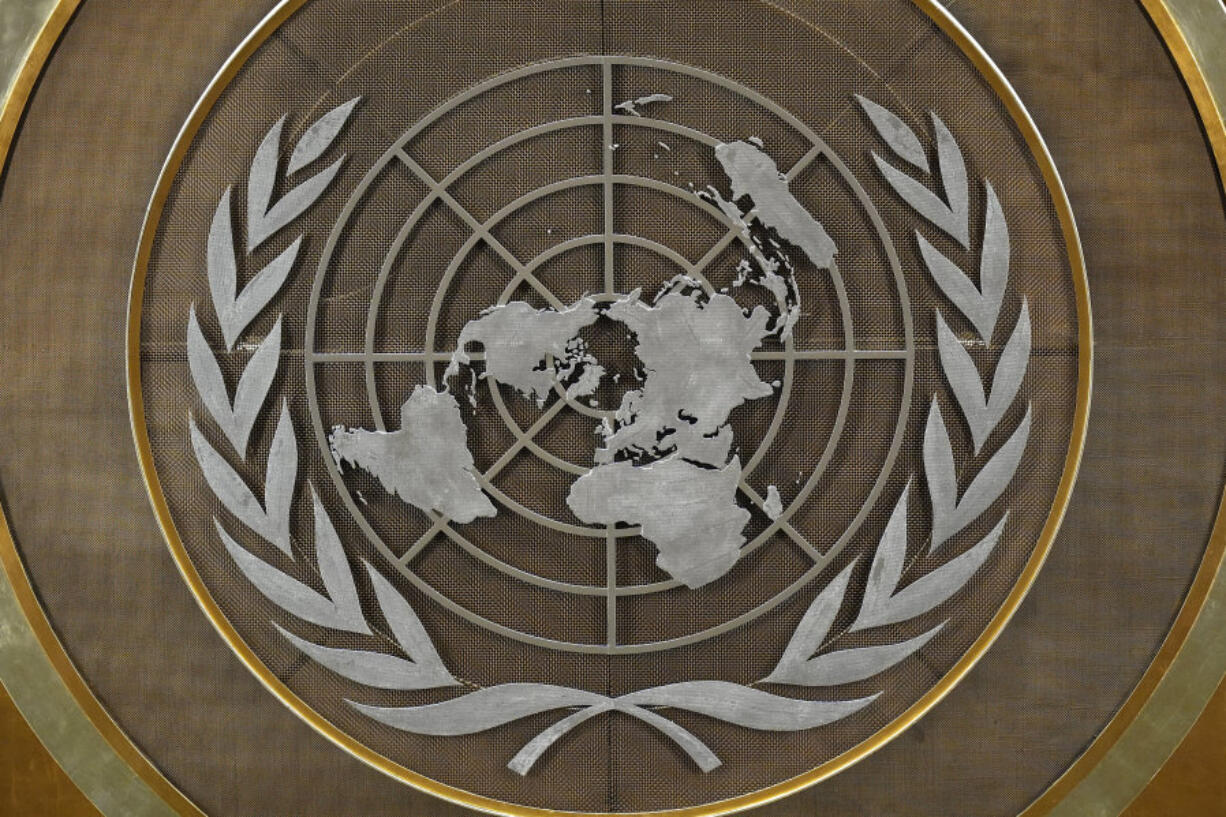 FILE - The United Nations logo is seen inside the 79th session of the United Nations General Assembly, Tuesday, Sept. 24, 2024.