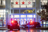 Police vehicles sit outside Macy’s at the Vancouver Mall on Thursday, Oct. 31, 2024, after a shooting.