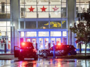 Police vehicles sit outside Macy’s at the Vancouver Mall on Thursday, Oct. 31, 2024, after a shooting.