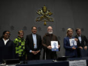 From left, Sister Niluka Perera, Teresa Morris Kettelkamp, Monsignior Luis Herrera, Cardinal Sean Patrick O&rsquo; Malley, jurist Maud de Boer-Buquicchio and clergy sex abuse survivor and victim&rsquo;s advocate Juan Carlos Cruz, pose for a photo at the end of a press conference to present the Vatican&rsquo;s first Annual Global Report on Minors Protection at the Vatican press center, Tuesday, Oct. 29, 2024.