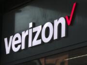 FILE - The Verizon logo is seen on a storefront, Friday, Sep. 1, 2023, in Boston.