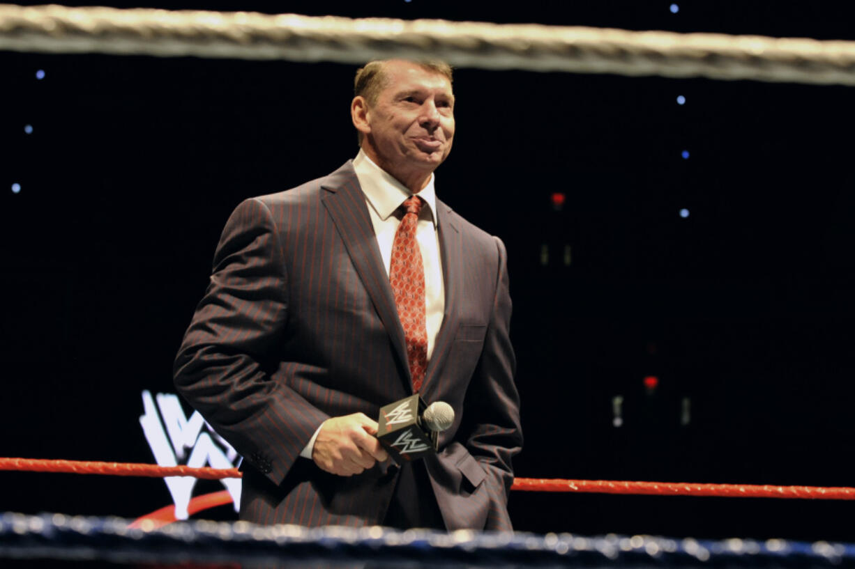 FILE - WWE chairman and CEO Vince McMahon speaks to an audience during a WWE fan appreciation event, Oct. 30, 2010, in Hartford, Conn.