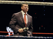 FILE - WWE chairman and CEO Vince McMahon speaks to an audience during a WWE fan appreciation event, Oct. 30, 2010, in Hartford, Conn.