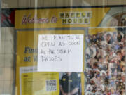 A sign on a closed Waffle House on Highway US 19 in anticipation of Hurricane Milton on Tuesday, Oct. 8, 2024, in New Port Richey, Fla.