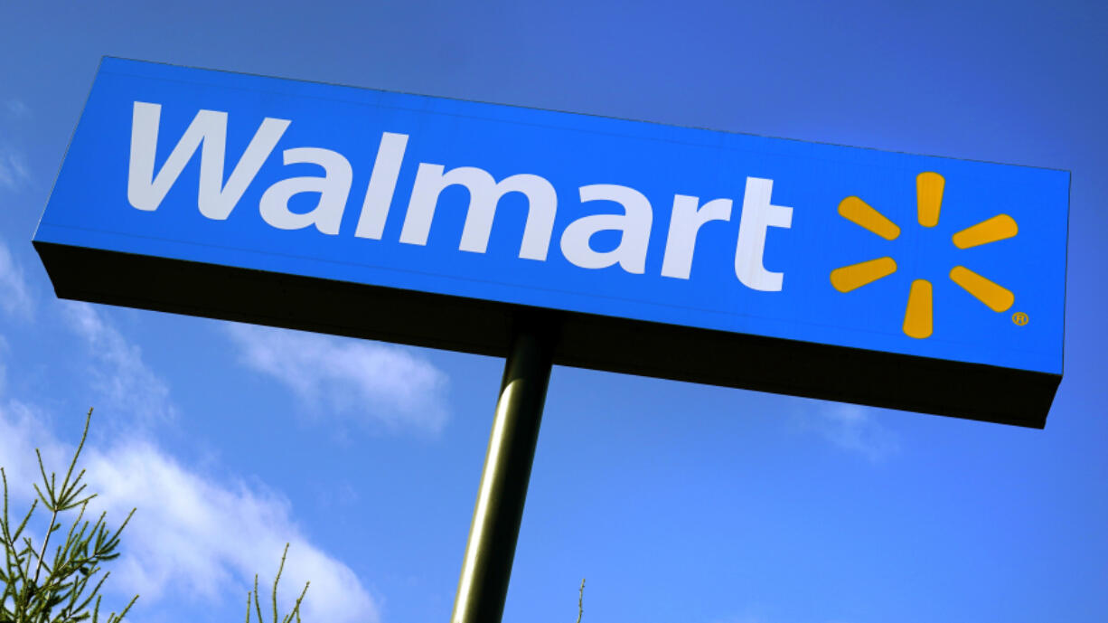 FILE - A Walmart store sign is visible from Route 28 Nov. 18, 2020, in Derry, N.H.