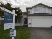 A sign notifies those passing by of a home for sale in Salmon Creek on Tuesday morning, Oct. 15, 2019.