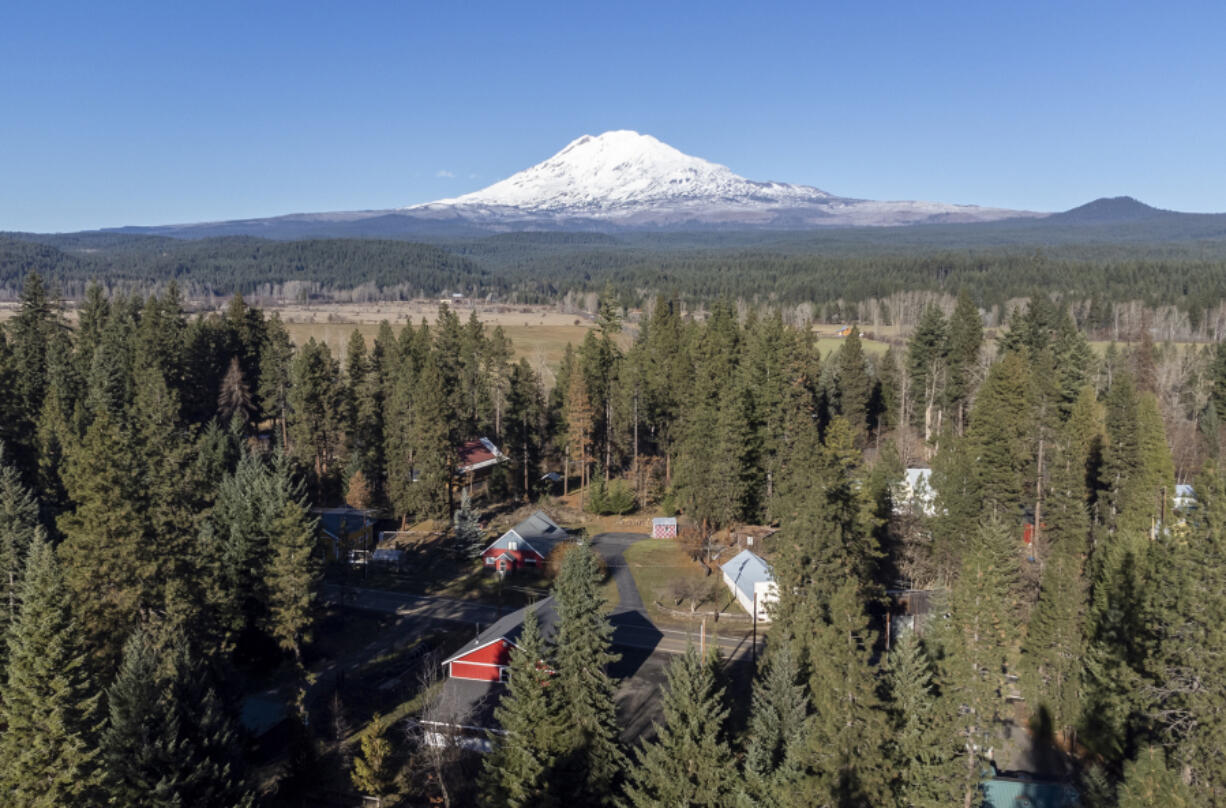 Mount Adams rises above Trout Lake on Nov. 24, 2023, in Klickitat County. Mount Adams experienced the most earthquakes &mdash; six small magnitude &mdash; in one month during September since monitoring at the volcano began in 1982.