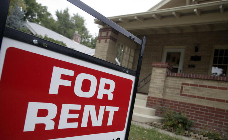 FILE - In this Sept. 24, 2007 file photo, a "for rent" sign is posted outside a home in Denver.   U.S. home rental prices rose at a slower pace in October, a possible sign that apartment costs are testing the upper reaches of renters’ incomes. Real estate data firm Zillow said Friday, Nov. 20, 2015 that median rents increased a seasonally adjusted 4.5 percent from a year ago.