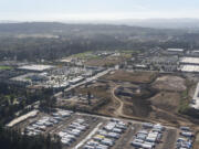 HP has submitted an update to its master plan for a campus in east Vancouver bear the intersection of 192 Avenue and First Street, pictured here in 2022.  The HP site is on the righthand side of the photo south of the semi parking area. Retail in Lacamas Crossing on the corner started opening earlier this year.