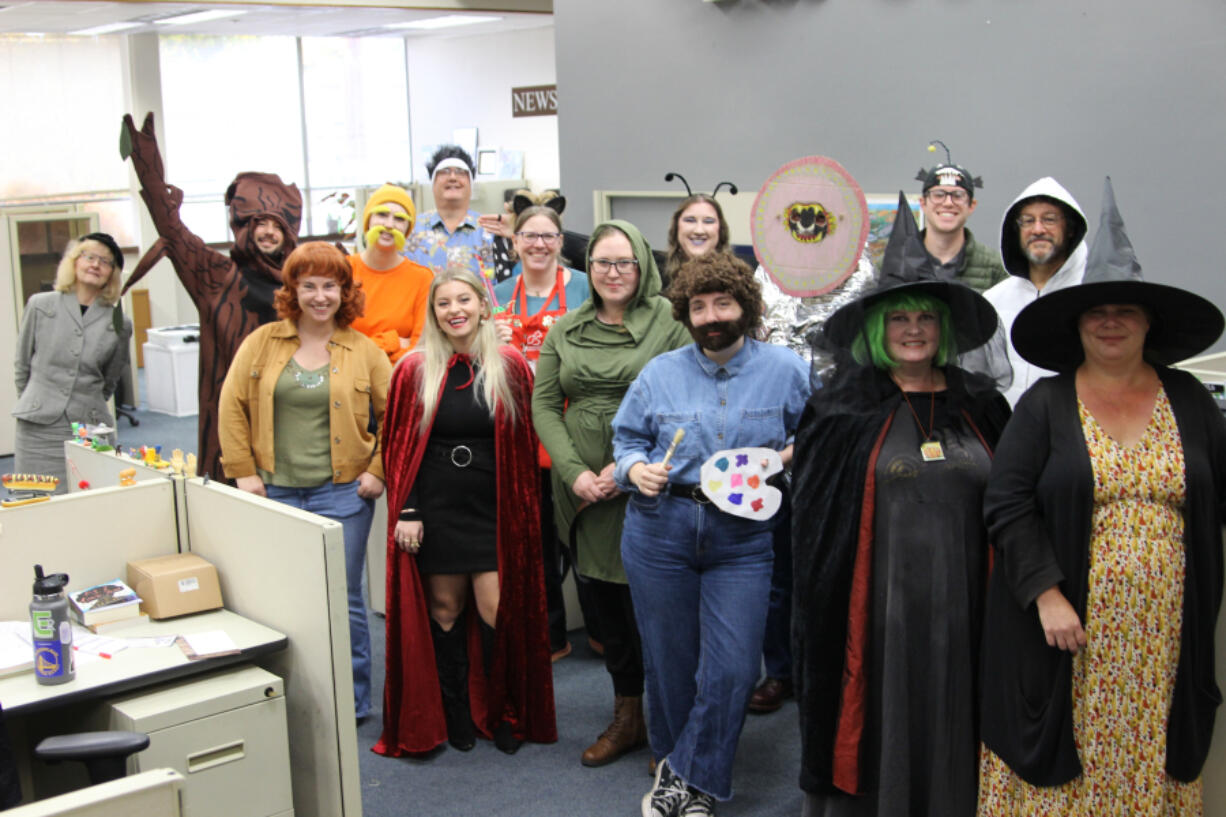 Members of The Columbian&#039;s news staff wore costumes to the newsroom on Halloween.