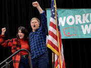 U.S. Rep. Marie Gluesenkamp Perez, D-Skamania, celebrates early election results with Tim Probst, chairman of the Clark County Democrats, on Tuesday night.