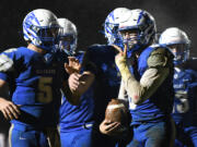 La Center senior Isaac Chromey, right, puts a finger up to his face Friday, Nov. 1, 2024, during La Center’s 29-21 loss to Seton Catholic at La Center High School. Seton won the 1A Trico League Championship with the victory.