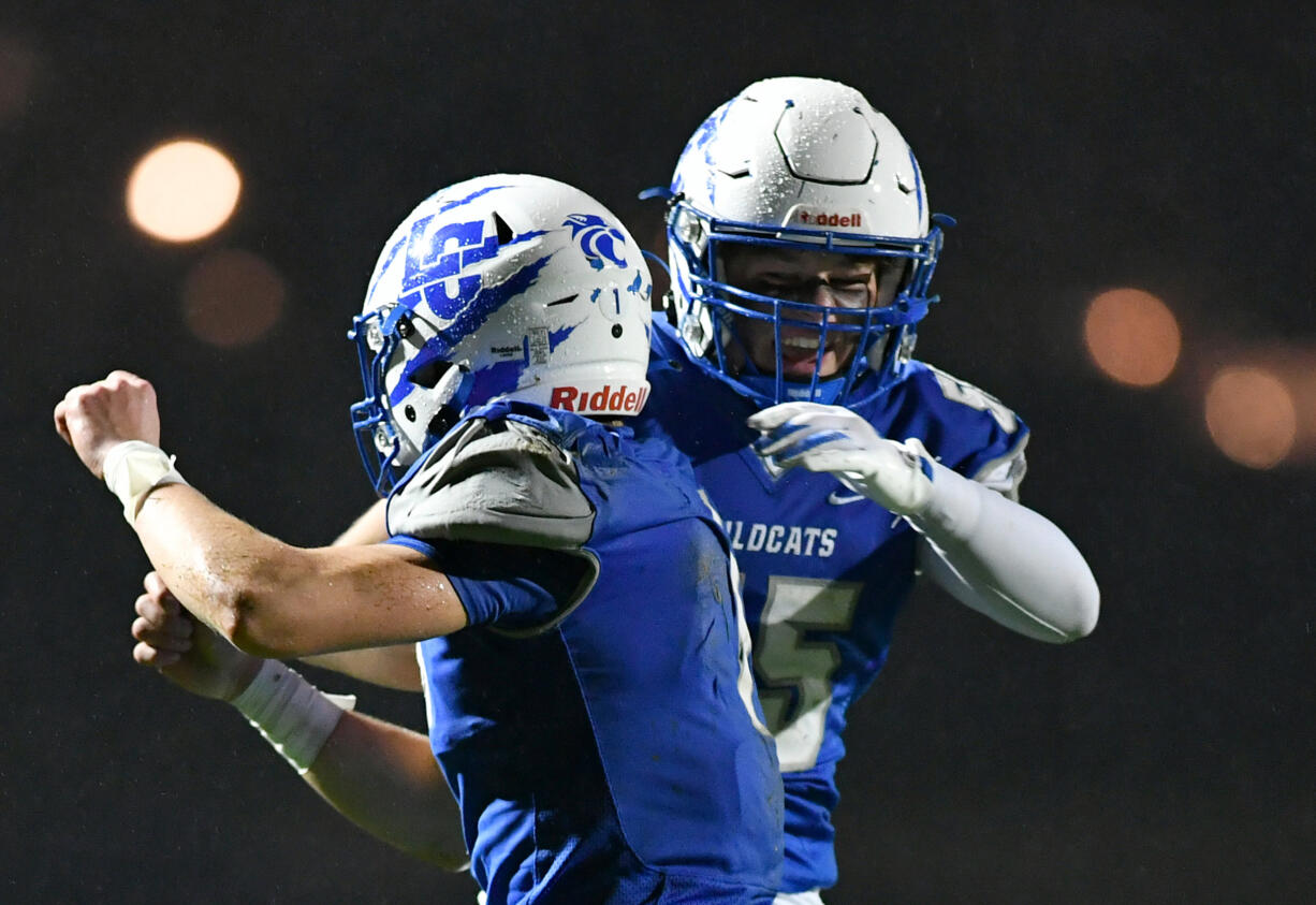 La Center senior Houston Coyle, left, and La Center junior Mason Klein celebrate after Coyle scored a touchdown Friday, Nov. 1, 2024, during La Center’s 29-21 loss to Seton Catholic at La Center High School. Seton won the 1A Trico League Championship with the victory.