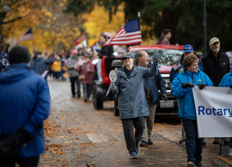 Rotary Club members march down Officer’s Row on Monday, Nov. 11, 2024, during the 36th Annual Lough Legacy Veterans Parade at Fort Vancouver National Historic Site.