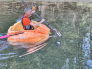 Gary Kristensen paddling his giant pumpkin down the Columbia River. The trip took place over Oct. 12 and 13.