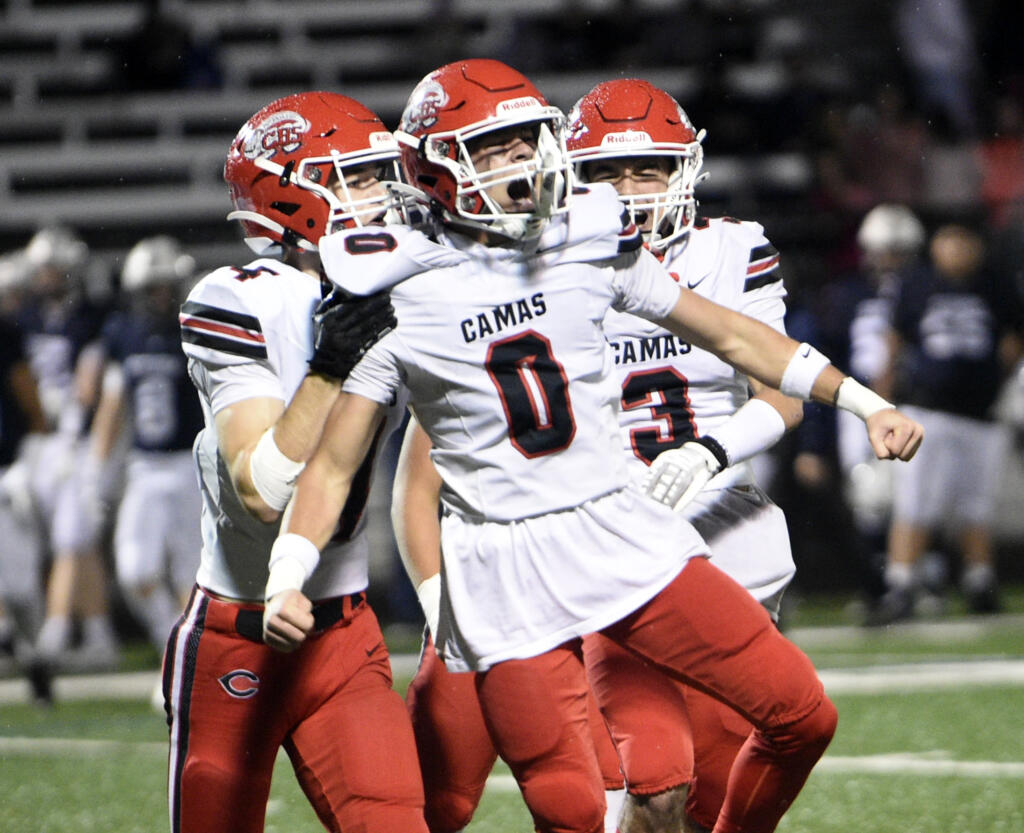 Jared Forner (0) of Camas celebrates after a punt return against Skyview during a 4A Greater St. Helens League football game at Kiggins Bowl on Friday, Nov. 1, 2024.